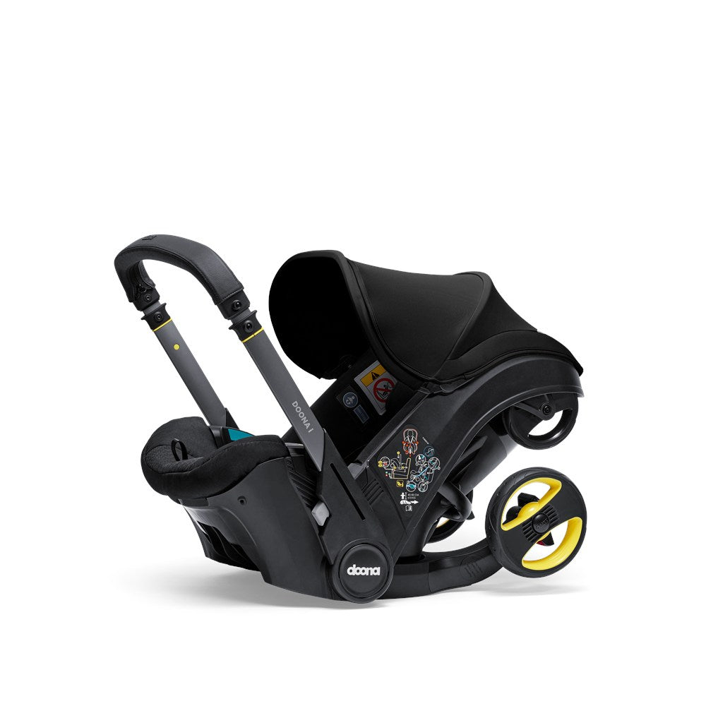 Doona i Bebek Arabasına Dönüşen Tekerlekli Gr 0 i-Size Ana Kucağı Oto Koltuğu - Nitro Black